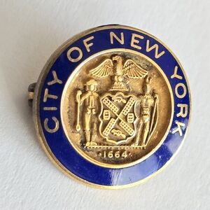Vintage New York pin small blue enamel gold tone metal NY City brooch